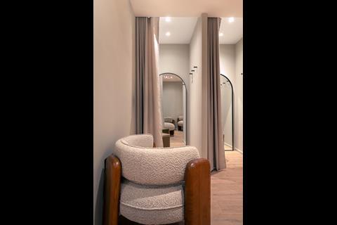 Sofas and mirrors in Tala store changing rooms